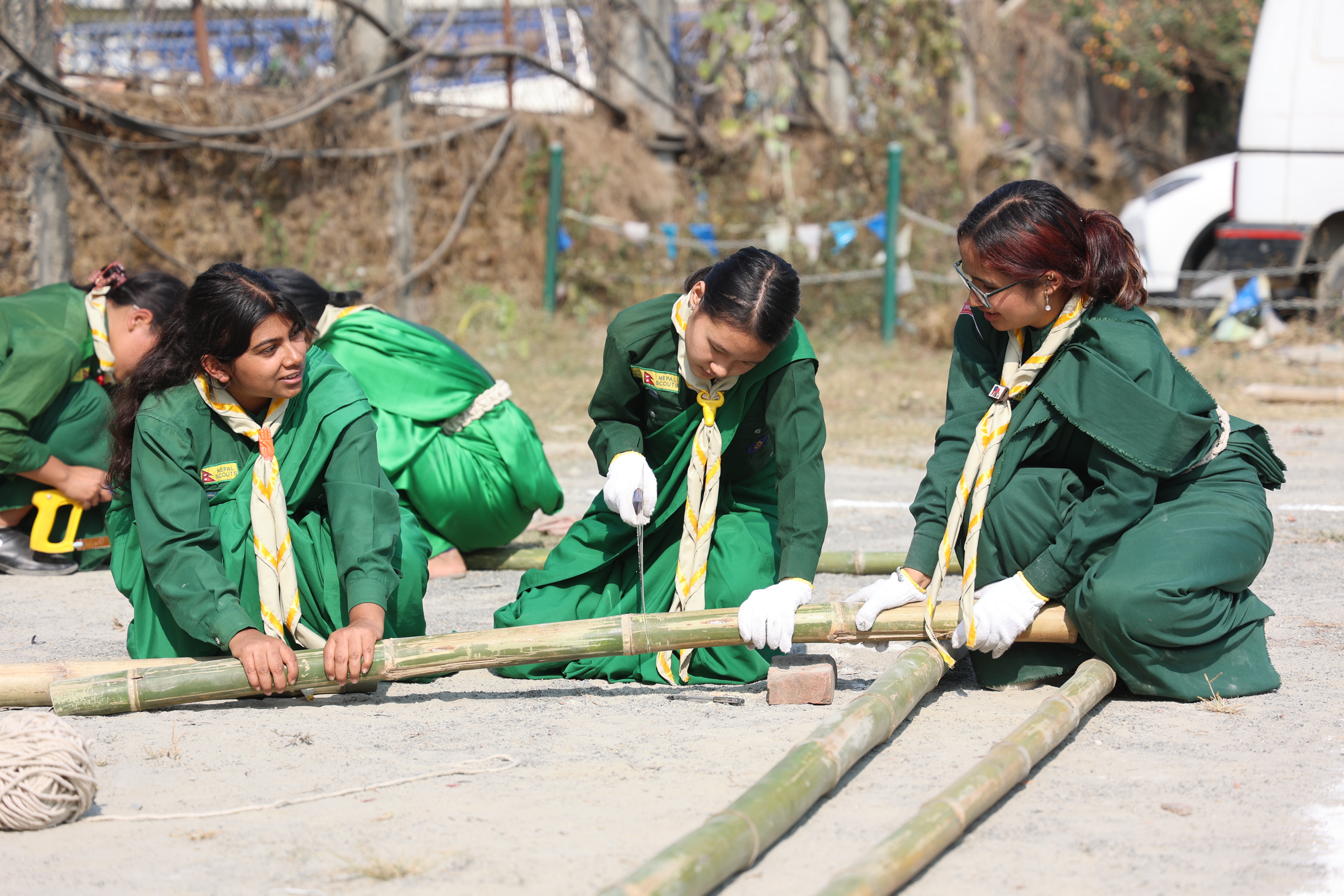 Young women involved in life skills and carpentry